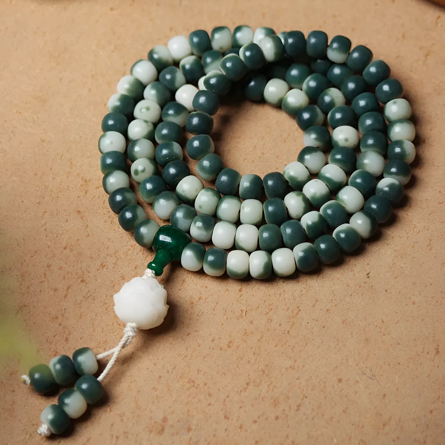 Lotus white jade Bodhi root bracelet with floating flowers pattern on 8x10mm beads