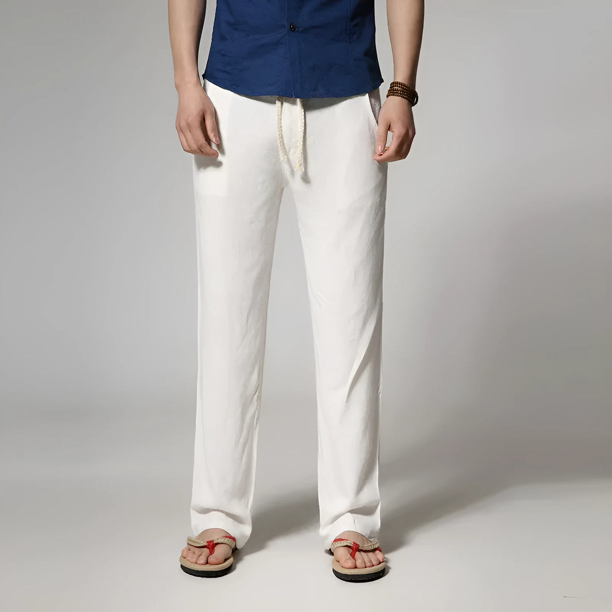 Men's straight leg casual trousers in cotton linen blend showing mid-waist design and straight leg opening