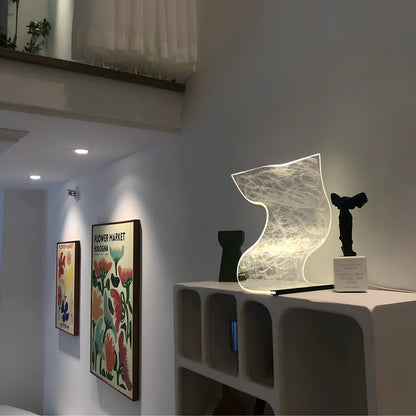 USB-powered bedside lamp with three colour settings and compact design
