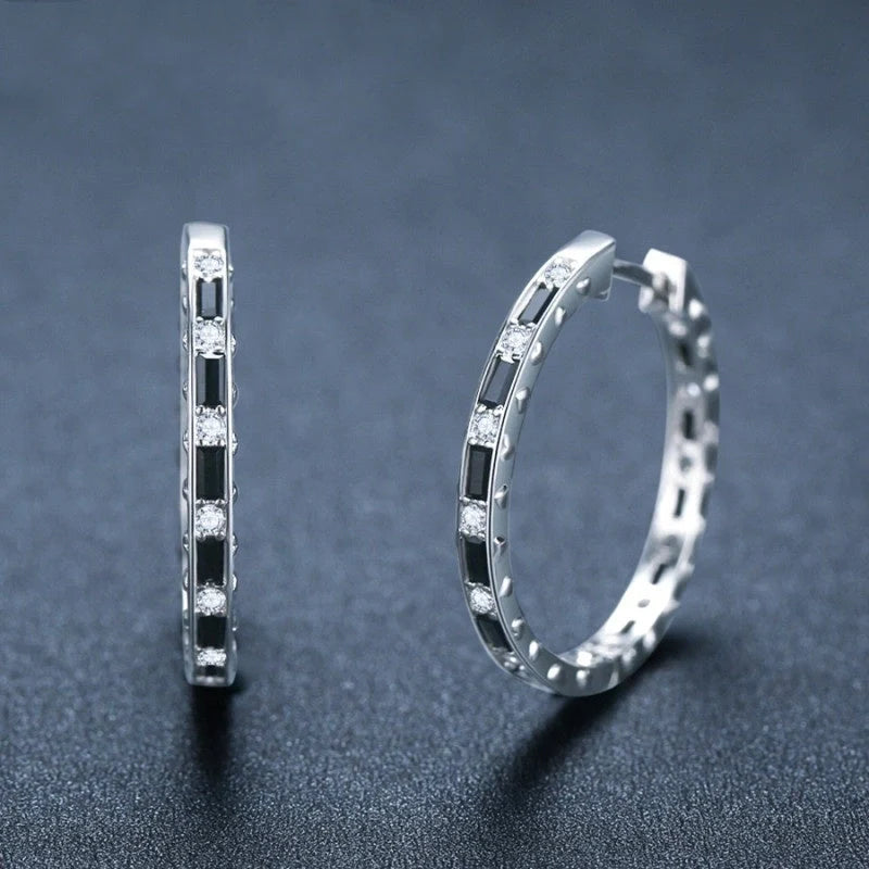 Elegant black zircon earrings featuring a geometric design, crafted from premium copper for a lustrous finish