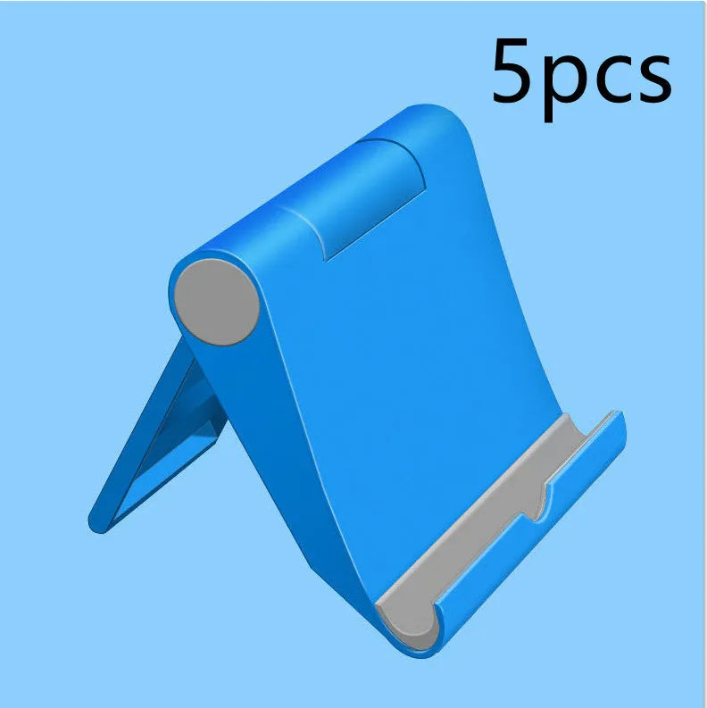 Black PE folding mobile phone stand holding a smartphone at an angle on a desktop.