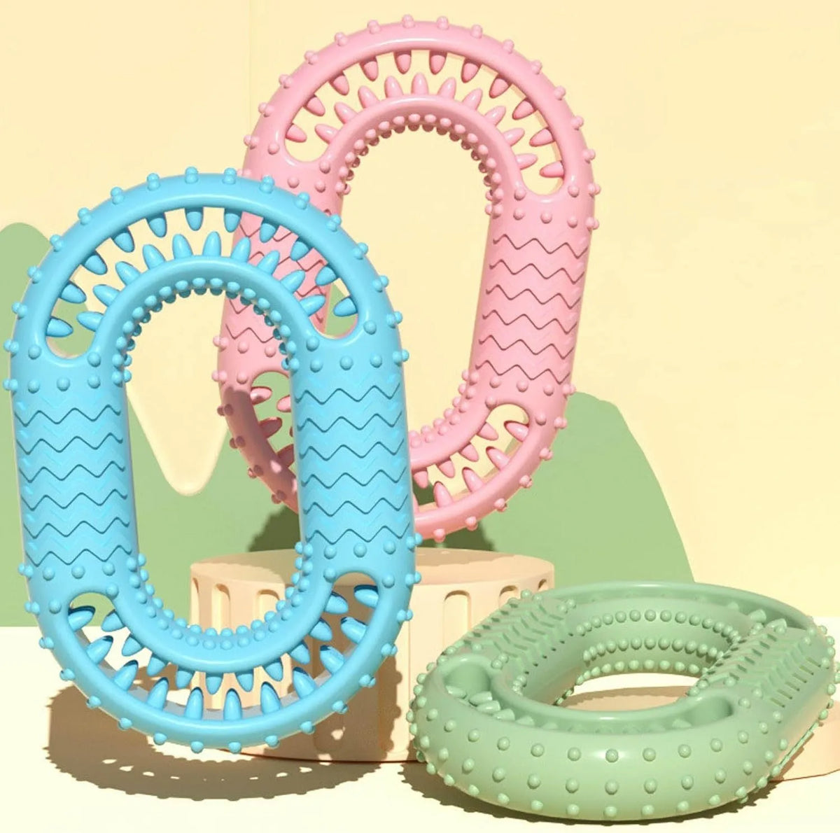 Blue O-ring shaped durable dog chew toy for aggressive chewers on a white background.