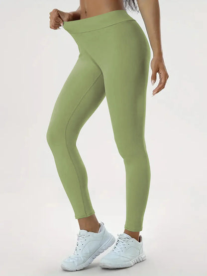 Women's high-waist yoga pants in various vibrant colors designed for comfort and style