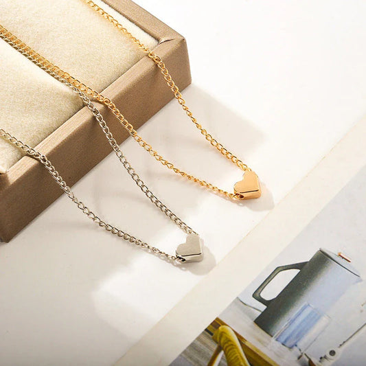 A stylish double-sided love pendant necklace made of premium alloy and featuring a chic geometric design, perfect for elevating any outfit.