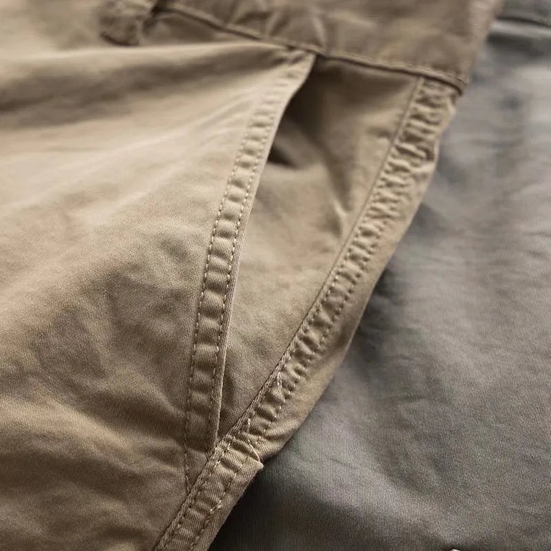 Men's multi-pocket labour protection trousers in solid colour with cropped length design