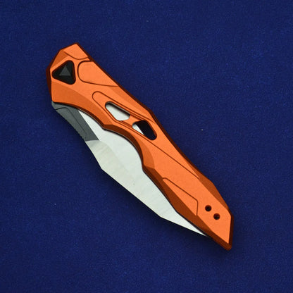 Black folding fruit knife with D2 steel blade and aluminium handle, shown open with length scale.