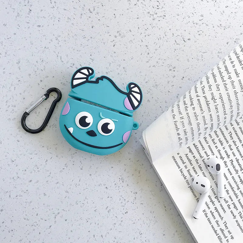 Green silicone AirPods case with raised cartoon animal design, showing charging port cutout.