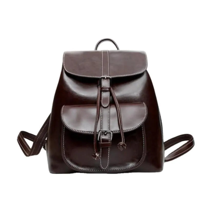 Korean style cowhide leather backpack in black with front sandwich pockets and internal organisation compartments