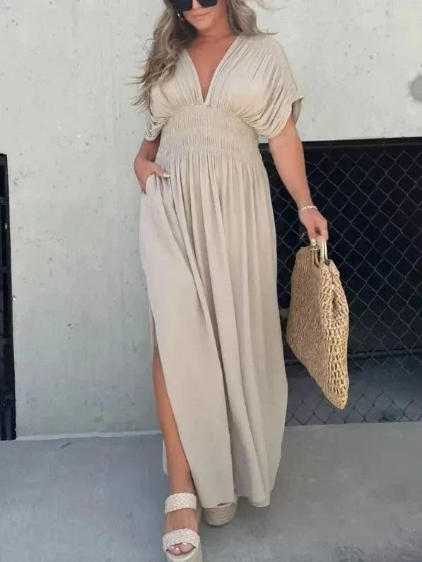 Elegant bat-sleeve v-neck slit dress in a variety of summer colors, featuring a flattering silhouette and comfortable polyester fabric