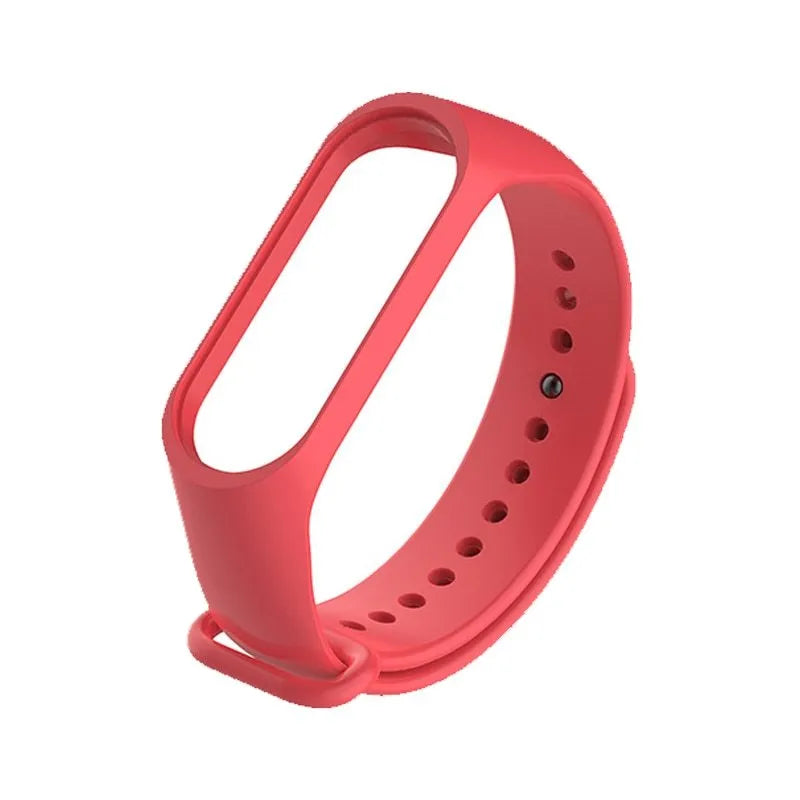 Colourful silicone replacement strap for XIAOMI MI Band 3 smart watch on a wrist.