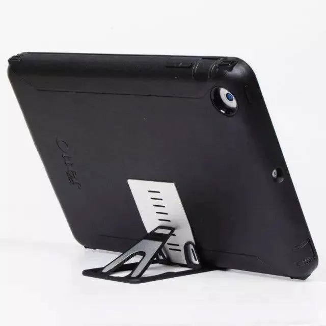 Black matte finish card phone holder with lazy bracket design on desktop