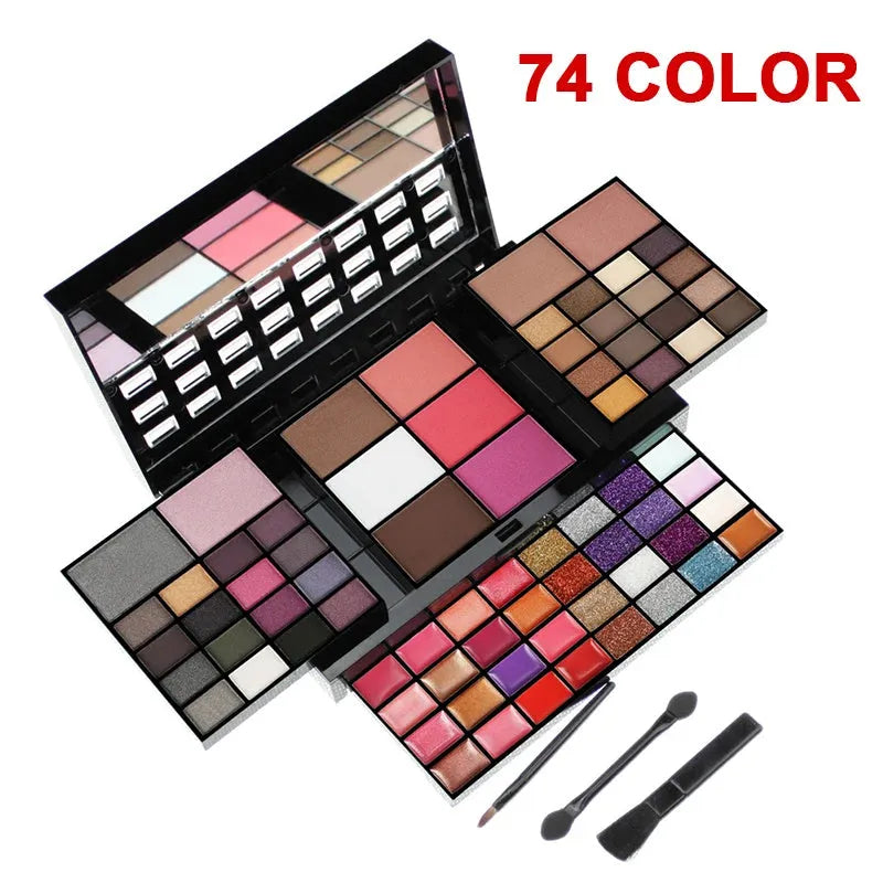 Open 74 colour makeup combination palette showing four layers of eyeshadow, lip gloss, blush and contour powders with brushes.