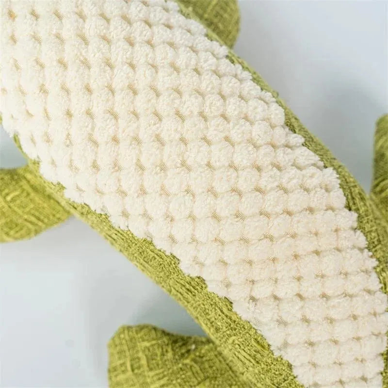 Blue corn grid plush toy for pets with biting sound function next to green and red versions.