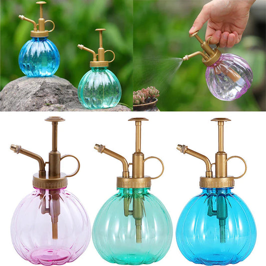 A stylish garden sprayer in a pumpkin shape with a retro-inspired copper pressure bar, designed for watering flowers and plants efficiently.