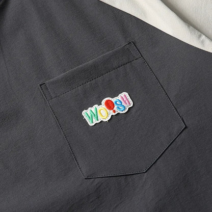 Dark grey men's loose fit t-shirt with contrasting colour raglan sleeves.