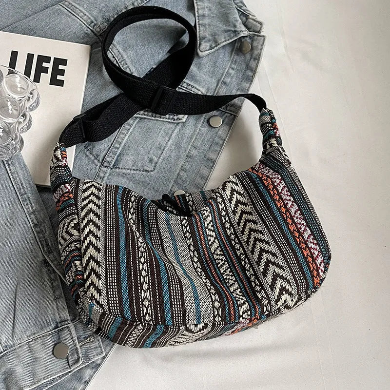 Women's ethnic style canvas crossbody dumpling bag in multiple colours with decorative sewing thread details