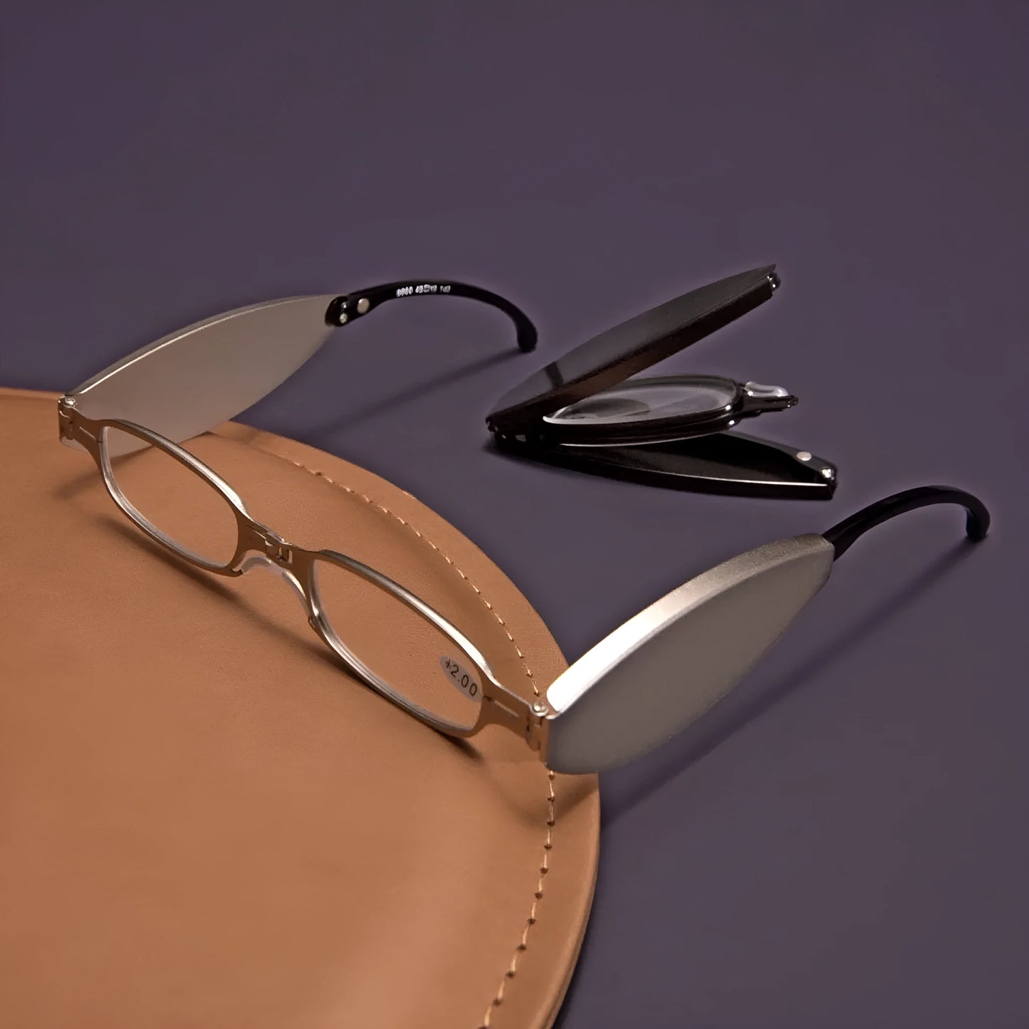 Black folding presbyopic glasses for men in a retro style with ring detailing.