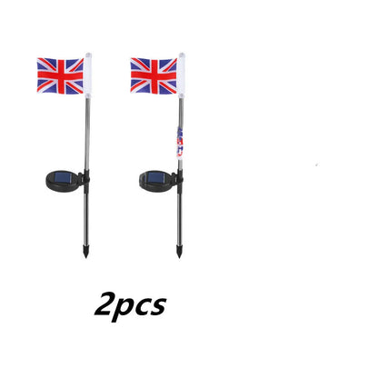 Solar garden flag light with American flag design on stainless steel pole, 34cm tall