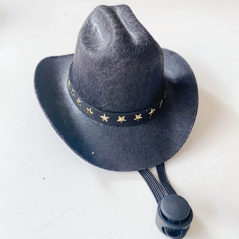 British cowboy hat for a cat on a stand, showing brown non woven fabric with a black ribbon trim.