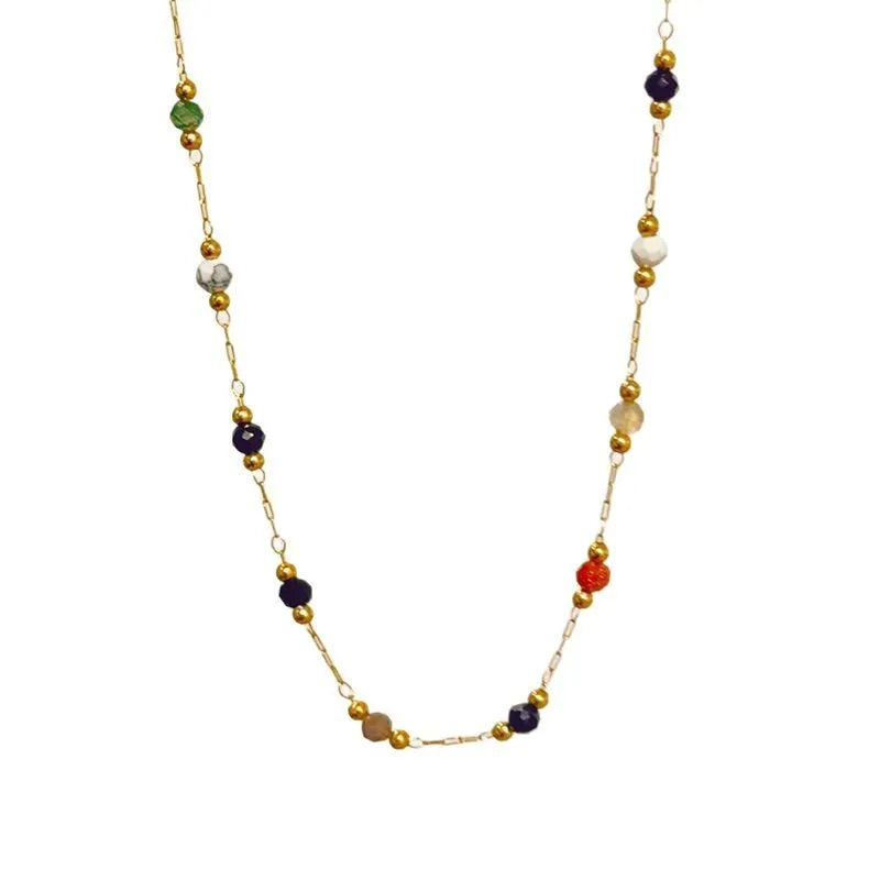 Gold electroplated titanium steel necklace for women with a natural stone pendant on an O-ring chain.