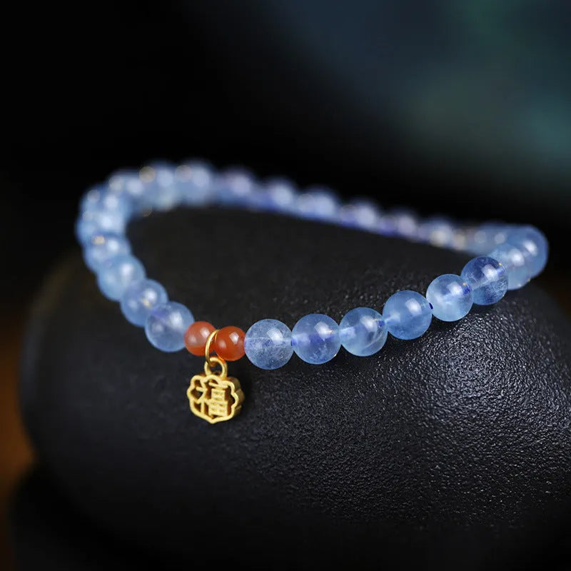 Ice translucent aquamarine crystal bracelet with 8mm round beads and sequin accents