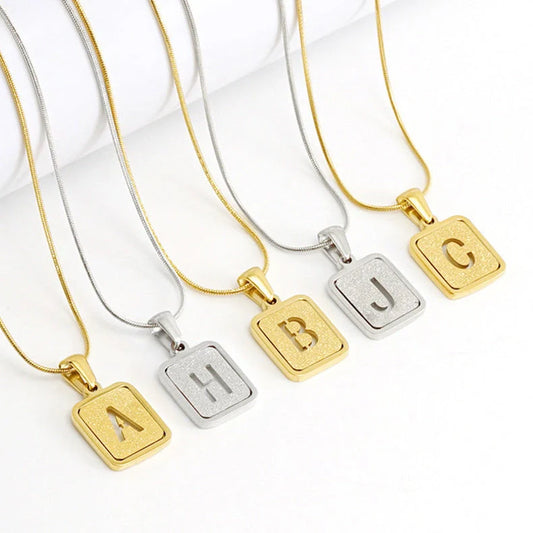 Alphabet necklace with hollow out square design in 18K finish, personalised with any letter A-Z
