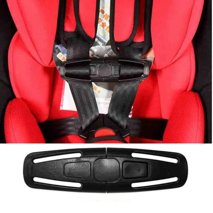 Black nylon seat belt clip for child car seat harness, showing button lock mechanism.