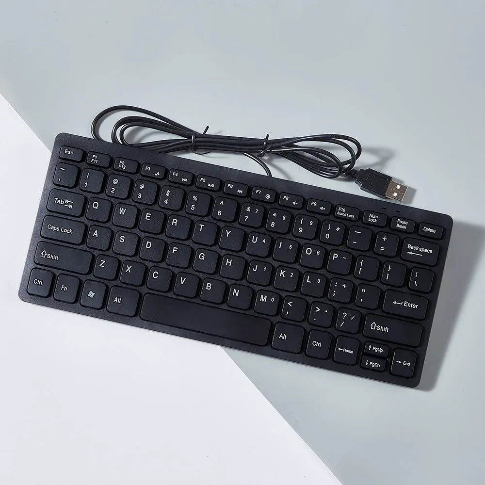 USB wired mini keyboard in four colour options showing compact 280mm design