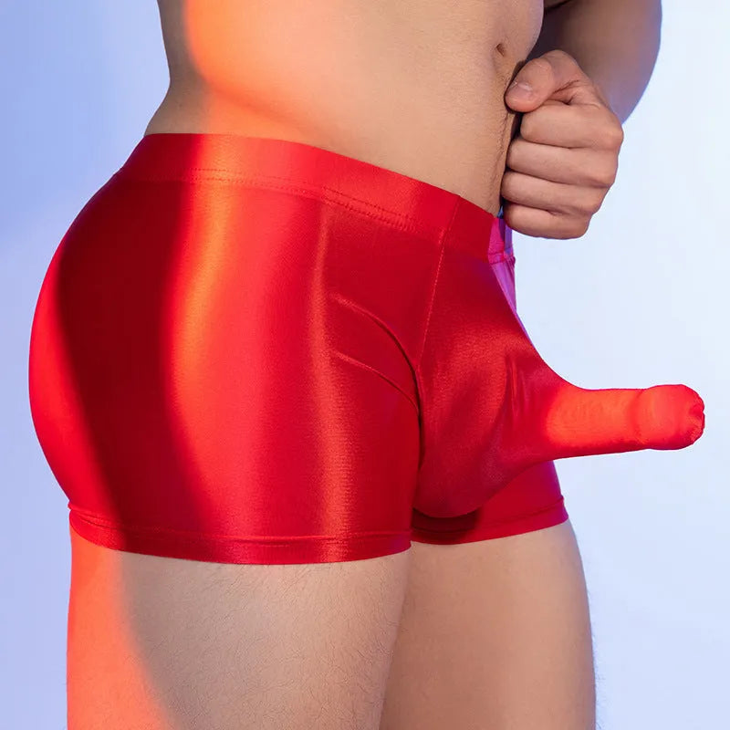 Men's red seamless boxer shorts with a mid-waist design and no visible interior stitching.