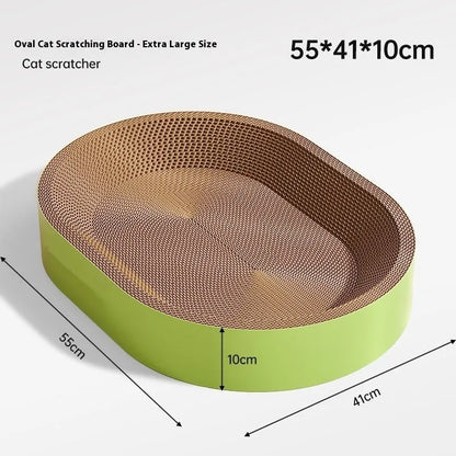Green oval corrugated paper cat scratch board and nest bed measuring 55cm diameter