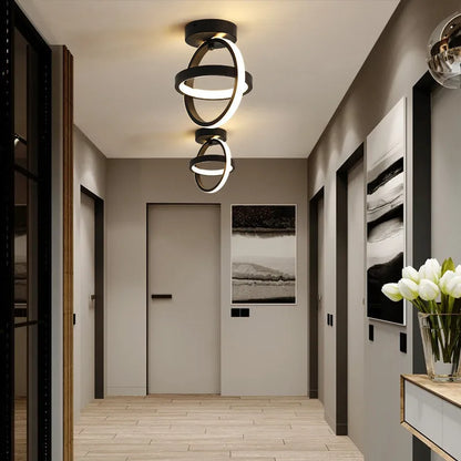 Modern round ceiling light with 21cm diameter and 25cm height in black or white finish