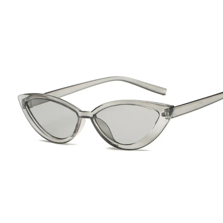 Cat eye sunglasses with PC frame, available in black, blue, grey, pink, purple, red, and yellow.