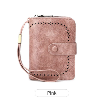 Small leopard print wallet with zipper closure showing stitching details