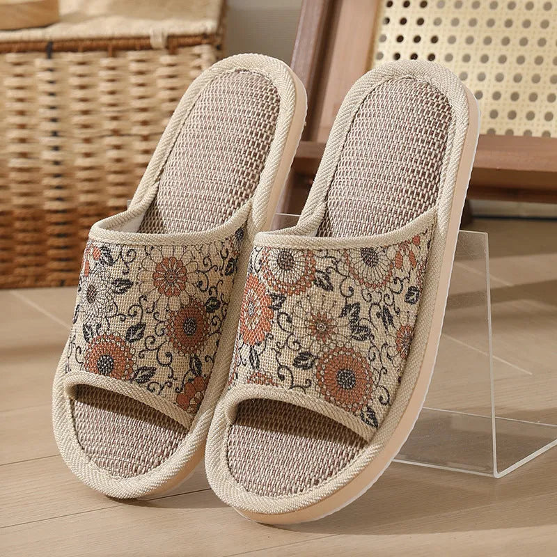 Women's open-toe linen slippers with thick sole in light brown colour.