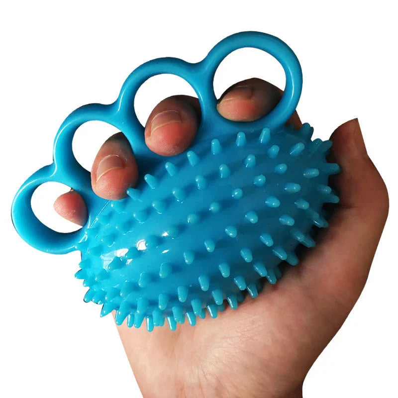 Therapeutic hand grip massager with massage bumps and finger holes for improving grip strength and relaxing hand muscles