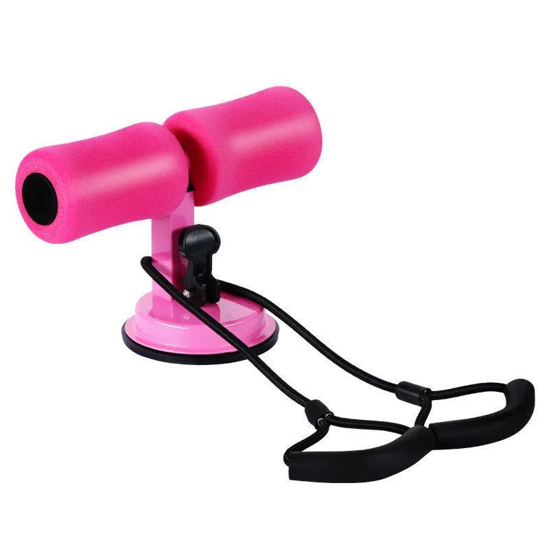 Compact sit-up strength trainer with steel springs and foam padding for home fitness
