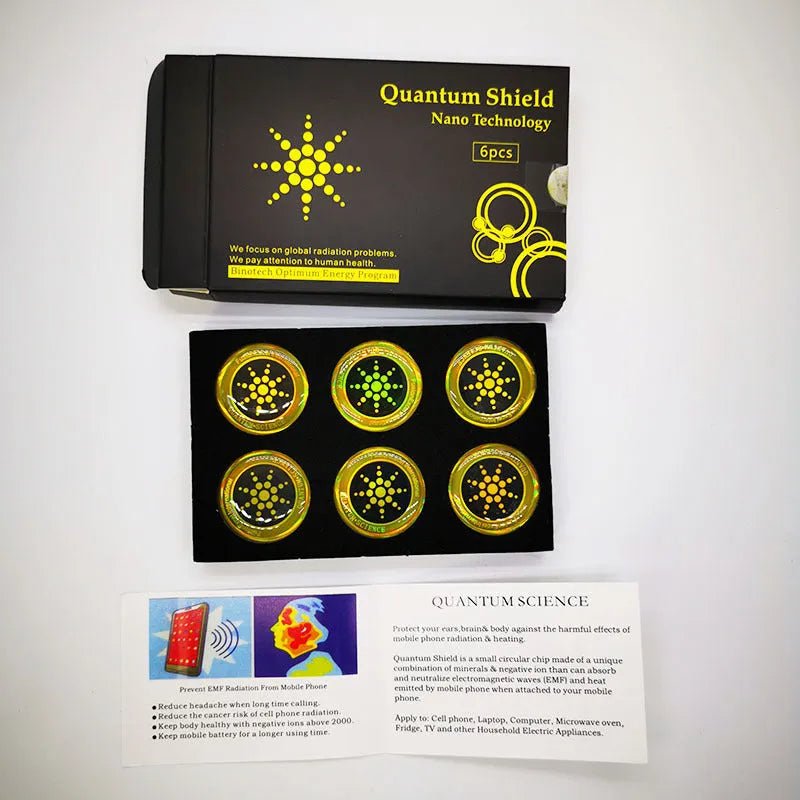 Box containing six gold and silver anti-electromagnetic wave stickers for mobile phones