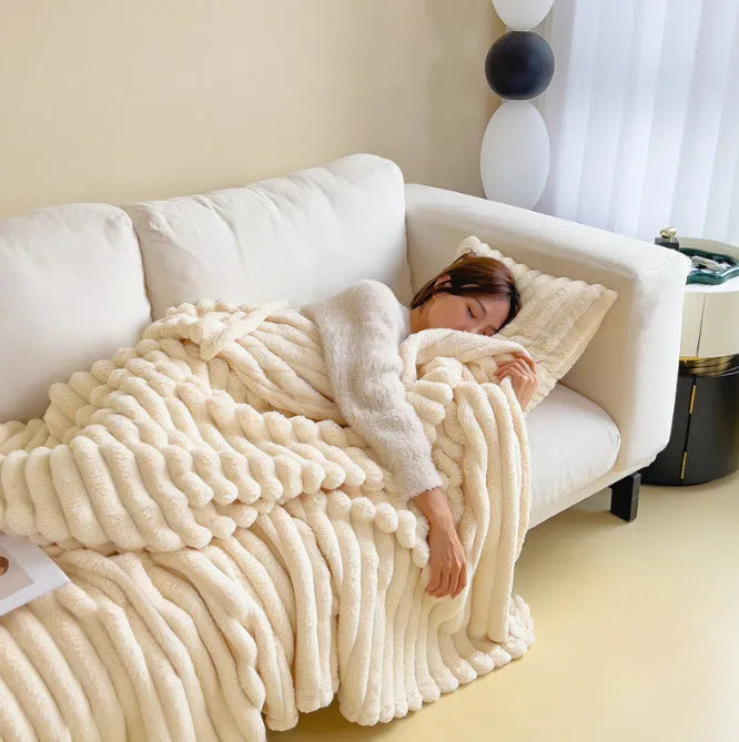 Double-sided bubble velvet faux rabbit fur blanket in a solid colour, shown folded.