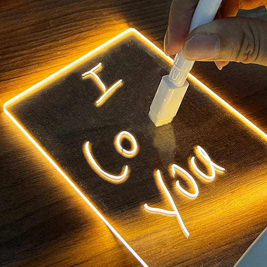 Customizable LED message board with warm lighting, acrylic design, and included erasable pen for personalized notes and artwork