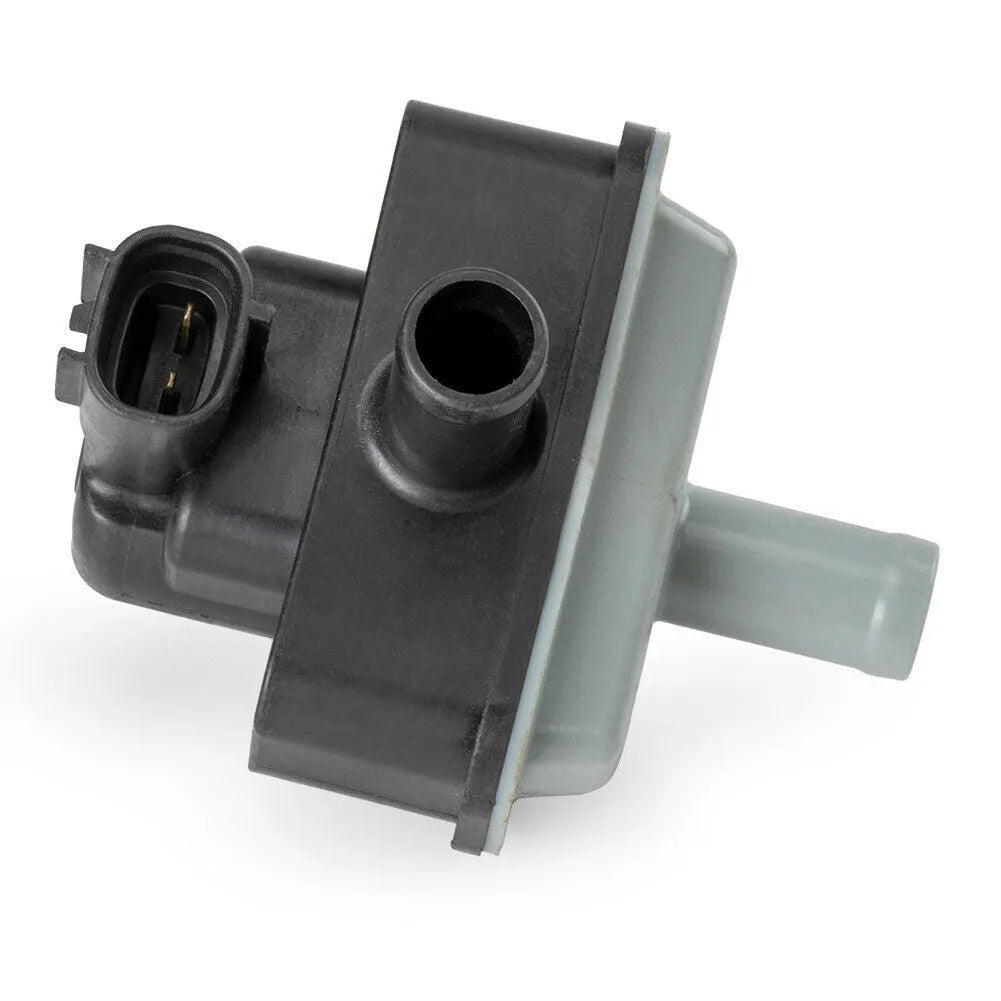Black vacuum solenoid valve with model number 90910-12283 for Toyota vehicles