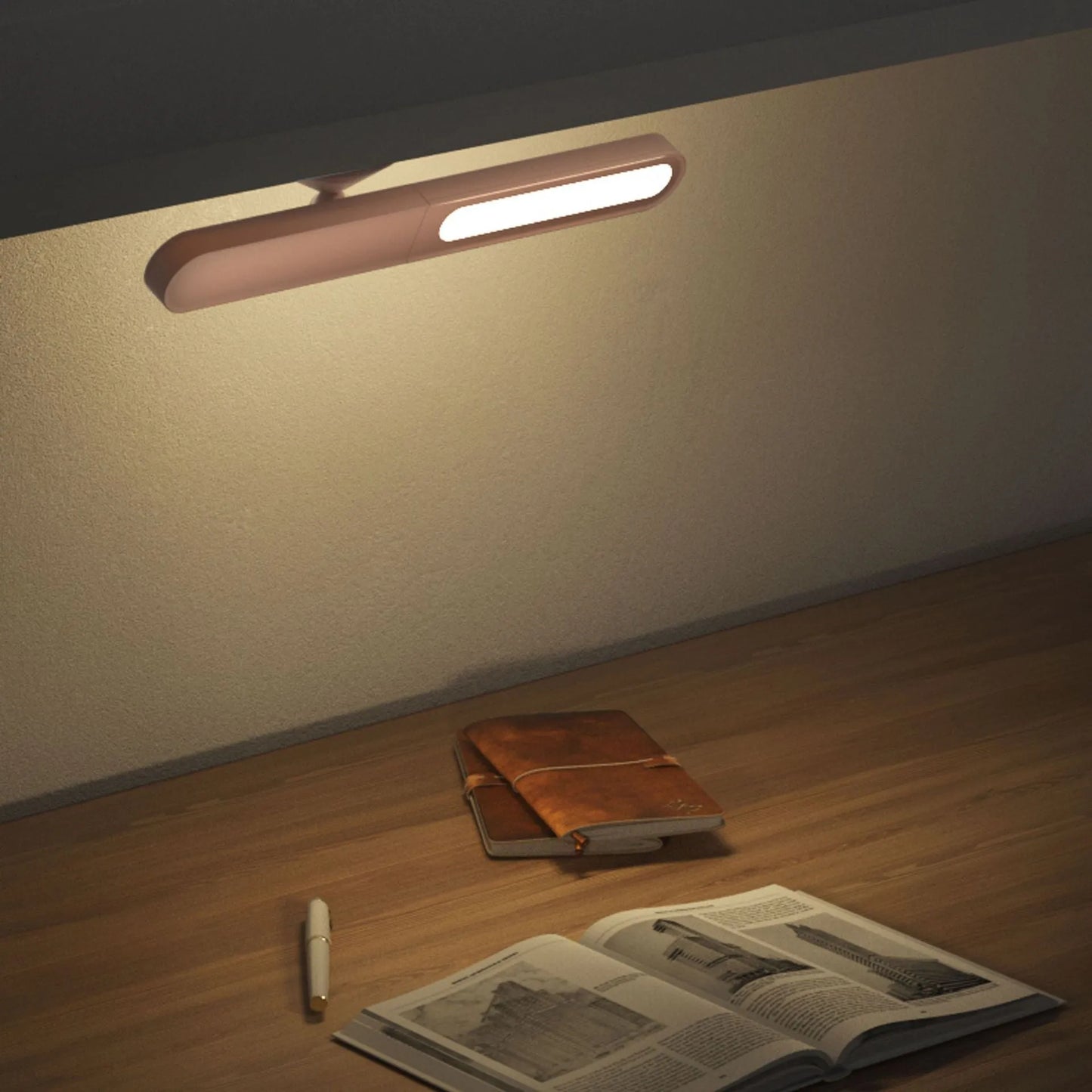 White geometric desk lamp with magnetic base and touch control on a wooden table.