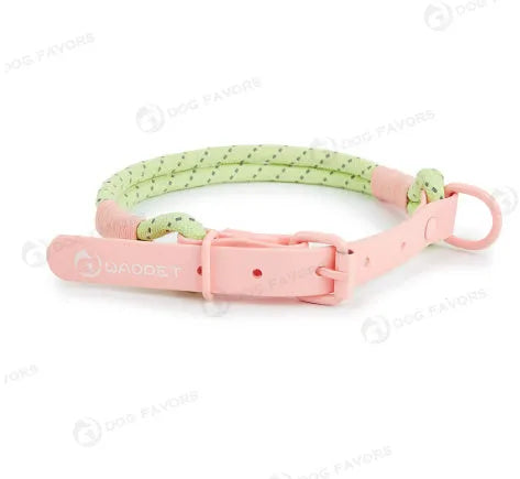 Solid colour PVC dog hand holding rope leash in dark red purple yellow showing collar attachment.