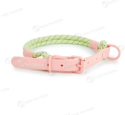 Solid colour PVC dog hand holding rope leash in dark red purple yellow showing collar attachment.