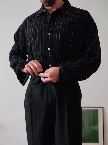 Men's black pinstriped long sleeve button-down shirt with a regular fit.