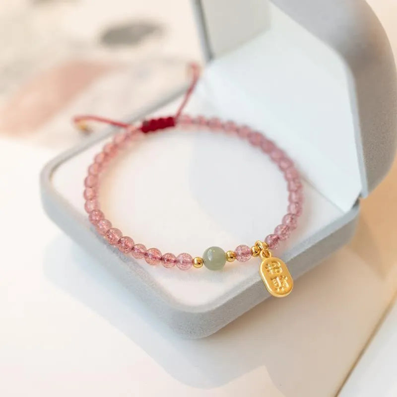 Red rope hand-woven bracelet with strawberry quartz crystals in national tide style