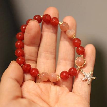 Handmade red agate and sunstone ethnic bracelet with star and Xiangyun designs for women