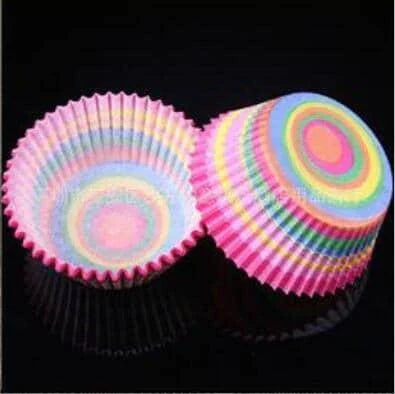 Colourful paper cupcake baking cups in a variety of vibrant shades, perfect for home baking and decorating