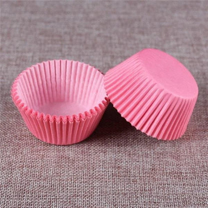 Colourful paper cupcake baking cups in a variety of vibrant shades, perfect for home baking and decorating