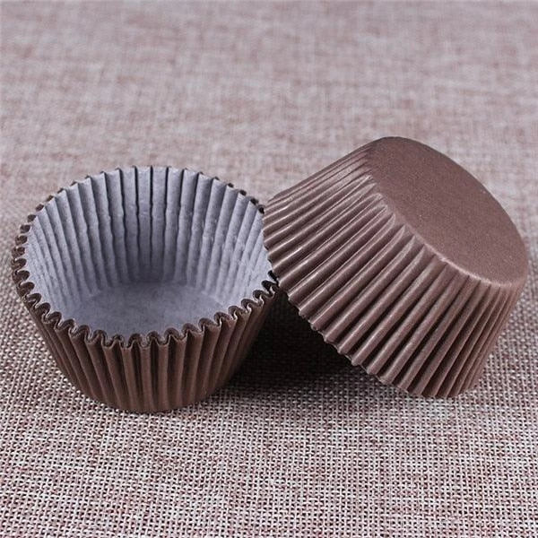 Colourful paper cupcake baking cups in a variety of vibrant shades, perfect for home baking and decorating