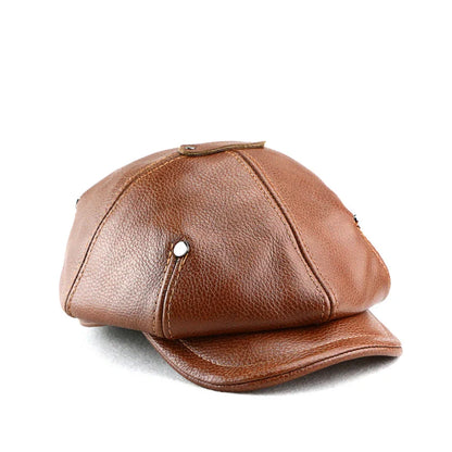 A British retro-style casual men's beret made of premium genuine leather in black, dark brown, or reddish brown colours